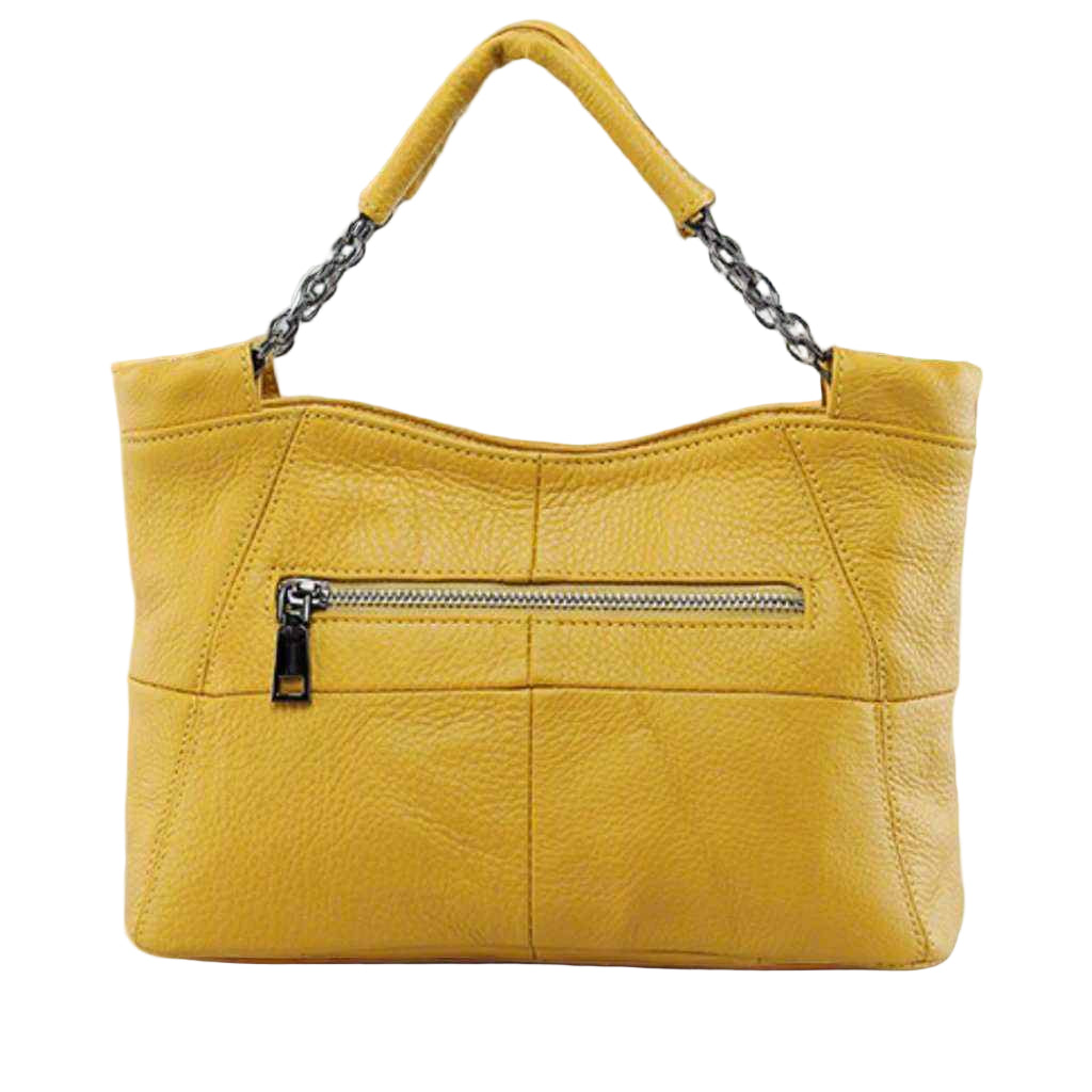 Yellow crossbody soft leather bag with chain-link handle and front zipper pocket on marble surface.