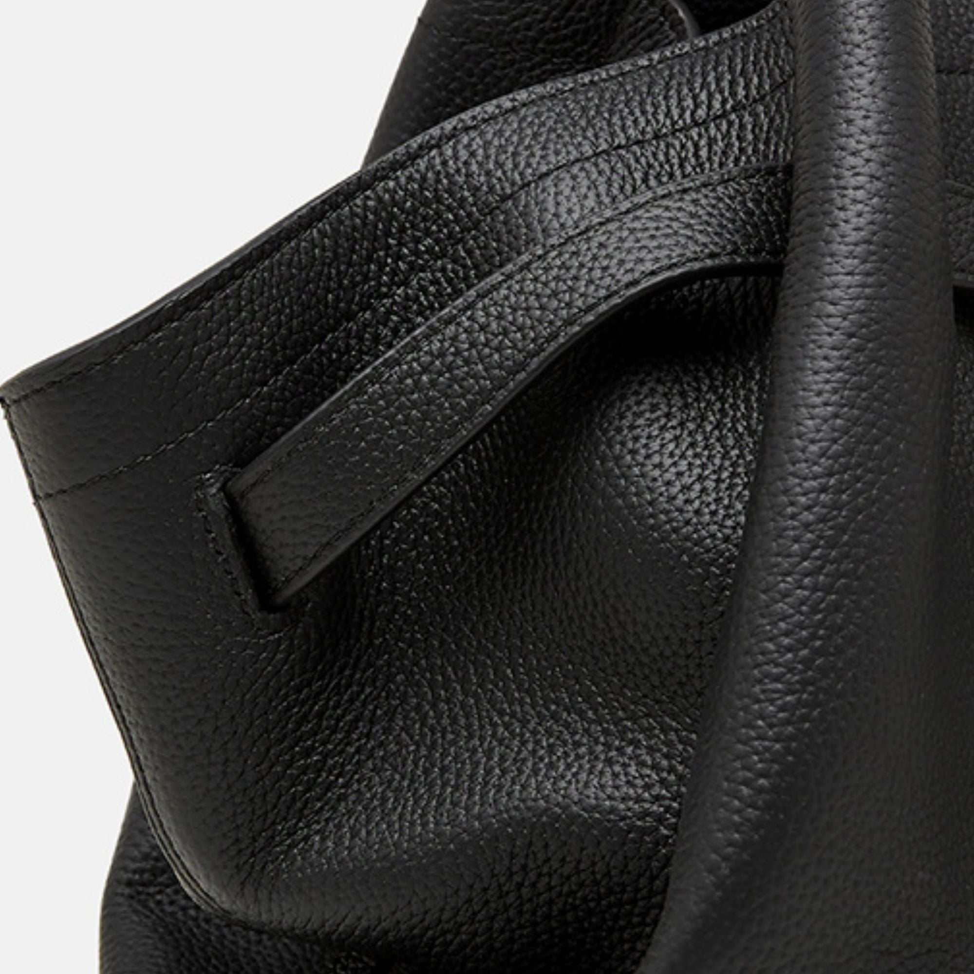 Premium full-grain leather work tote with rolled handles and spacious basket silhouette