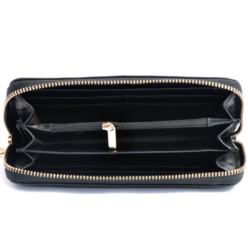 Interior view of Ladies Leather Floral Wallet, showcasing ample space for cash, cards, and coins.