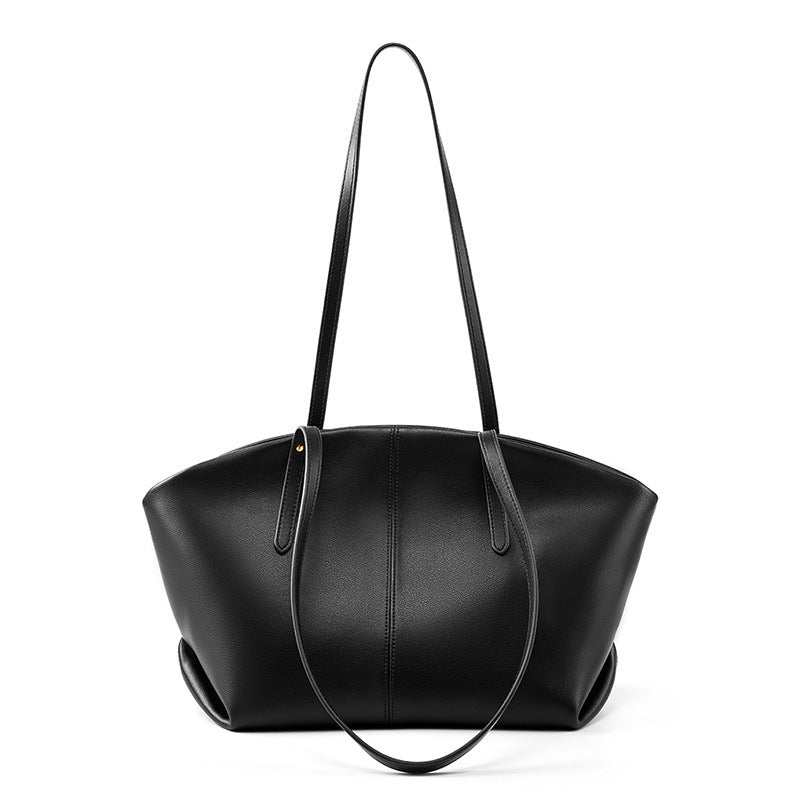 Large leather work tote in black with long handles and sleek design.
