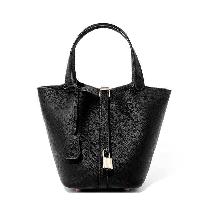 Lychee Leather Basket Tote in black, durable genuine leather with modern design, removable interior bag, lightweight.