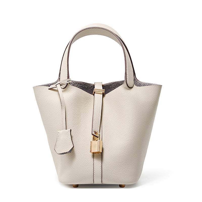 Lychee Leather Basket Tote in durable genuine leather with a modern silhouette and removable interior bag.