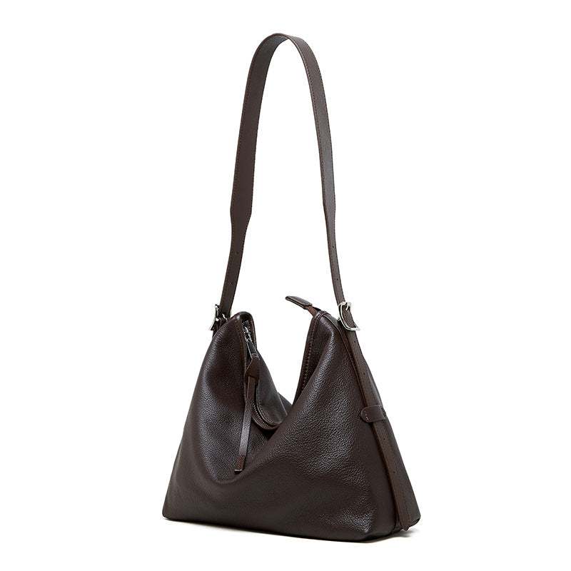 Medium Simple Leather Hobo bag in genuine leather, versatile design with adjustable strap and multiple pockets.