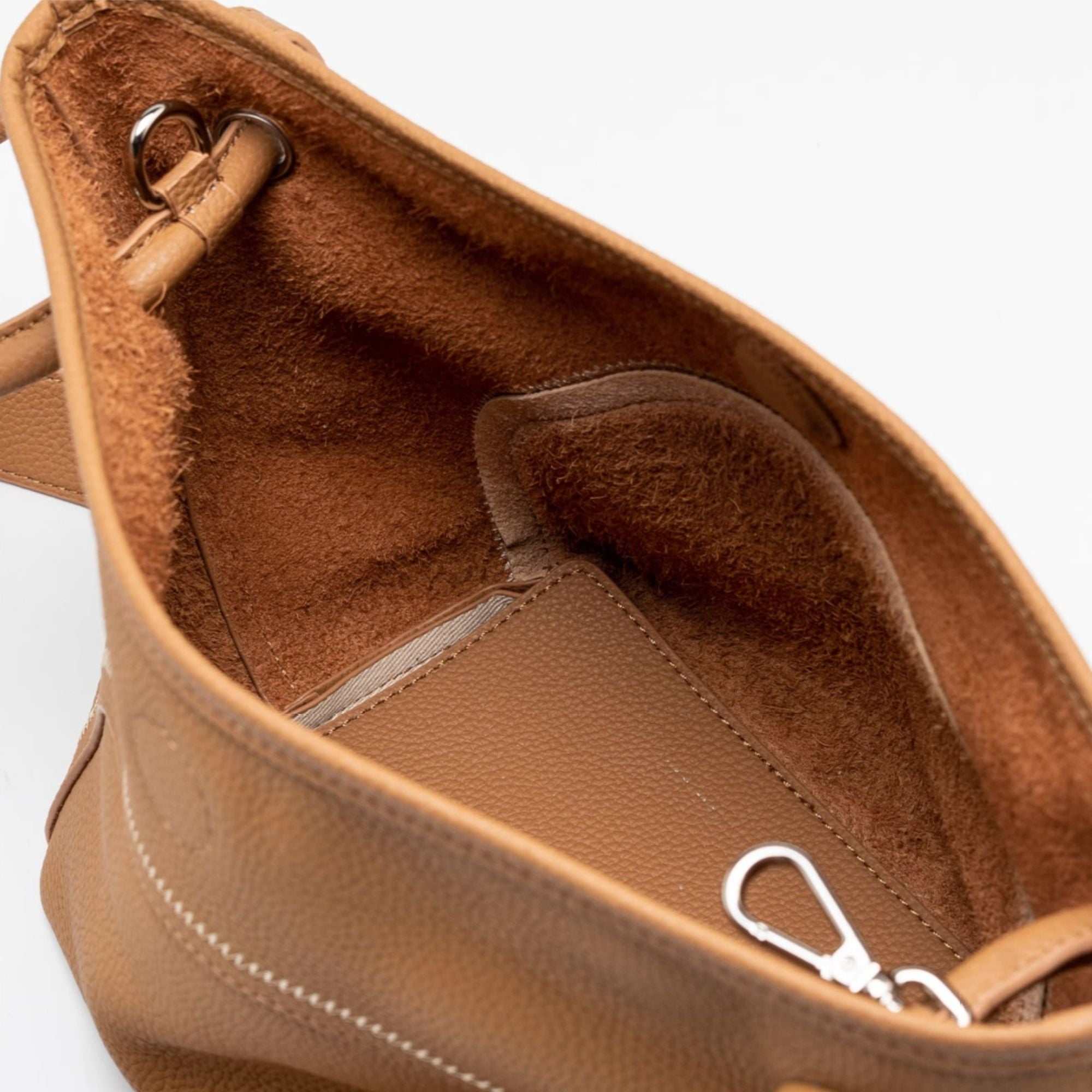 Mercer full-grain leather crossbody bucket tote with circular handles and removable interior pouch