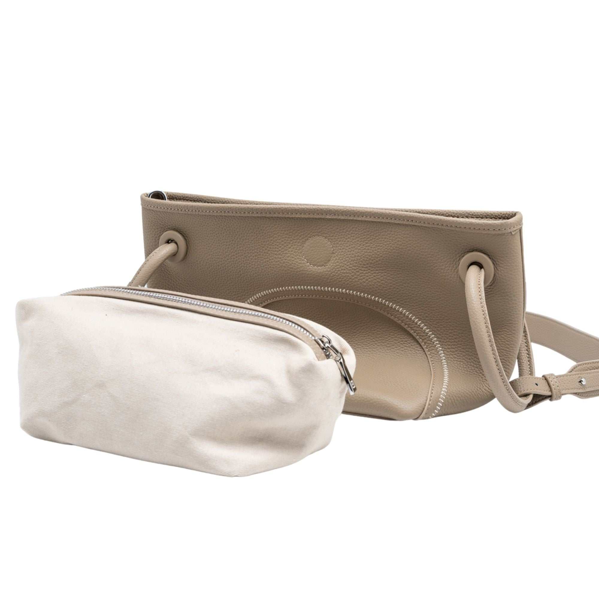 Mercer leather crossbody bucket tote with circular handles and removable pouch