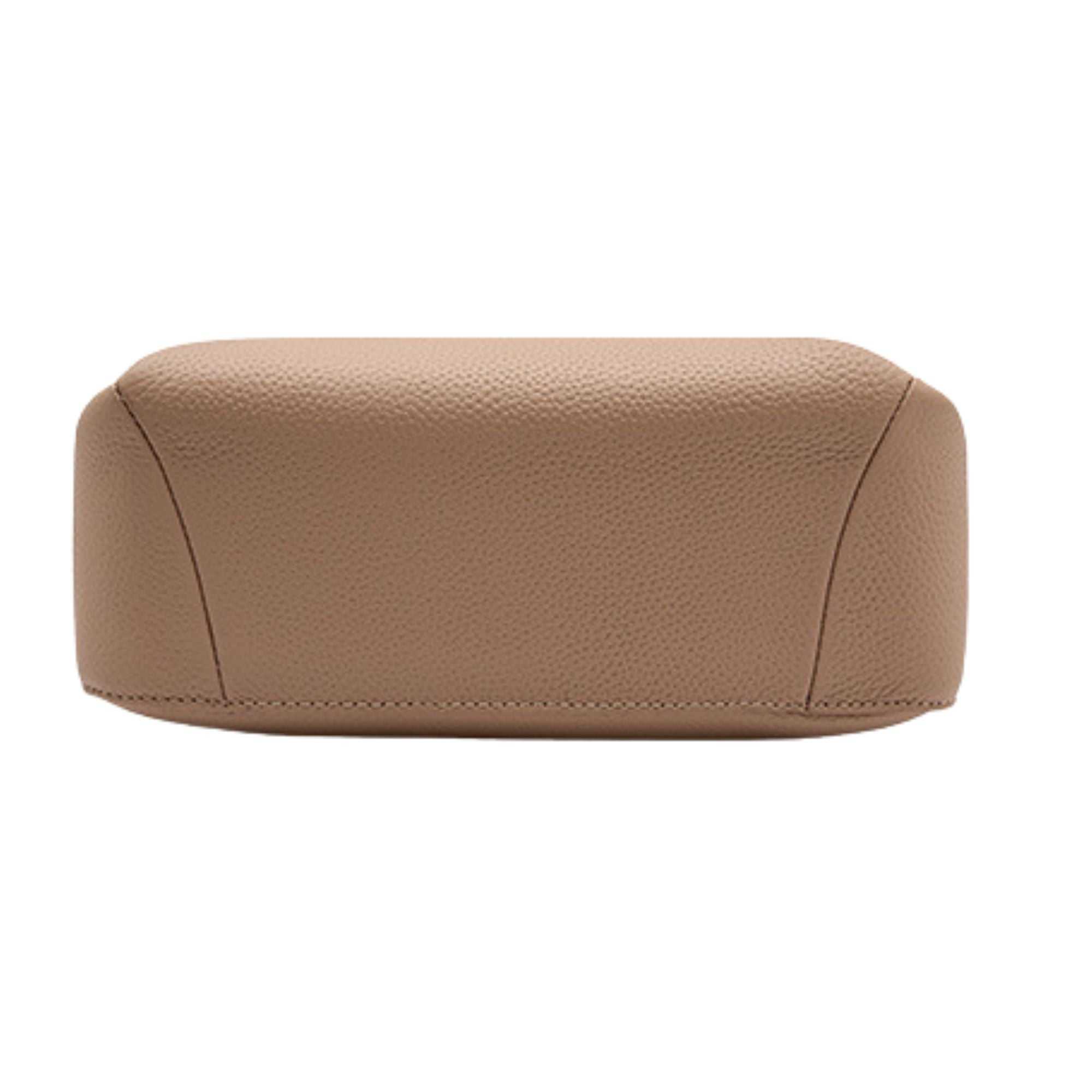 Bottom view of modern soft leather handbag showcasing its durable craftsmanship.