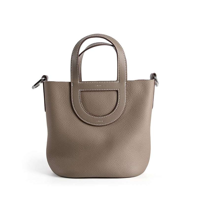 Sleek Leather Bucket Handbag with genuine leather and lychee-pattern, compact design