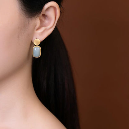 Model Burnished Jade Earrings