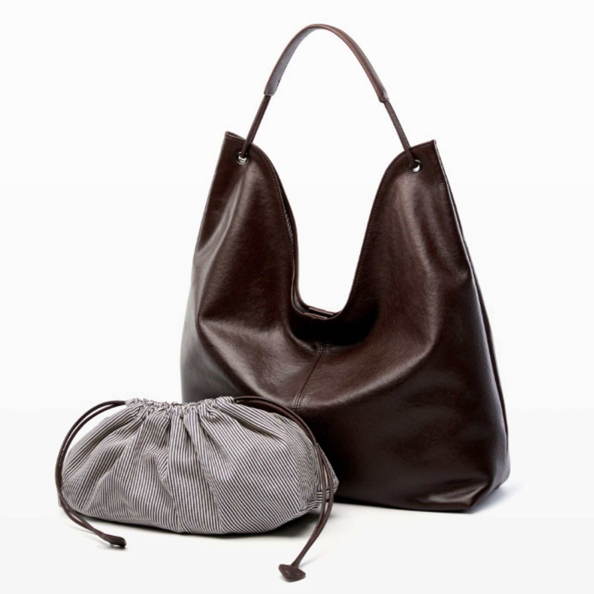 Hobo Slouch Purse made of genuine leather with removable drawstring interior bag.