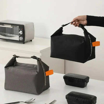 Adult Lunch Tote Bag on kitchen counter with portable, insulated design and practical size for meals and snacks.