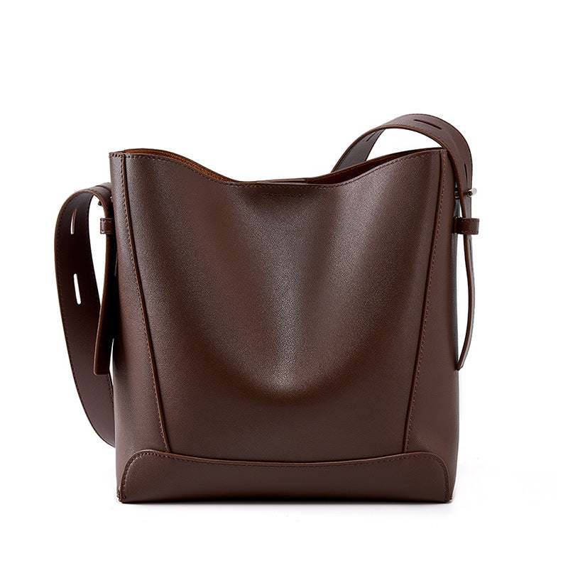 Premium genuine leather bucket tote purse with spacious interior and reinforced stitching.