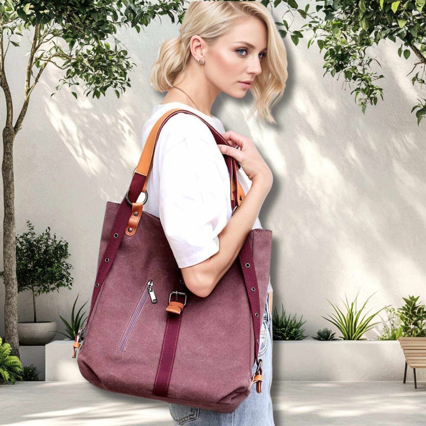 Convertible backpack purse handbags with vegan leather accents, worn on a woman's shoulder in a stylish outdoor setting.