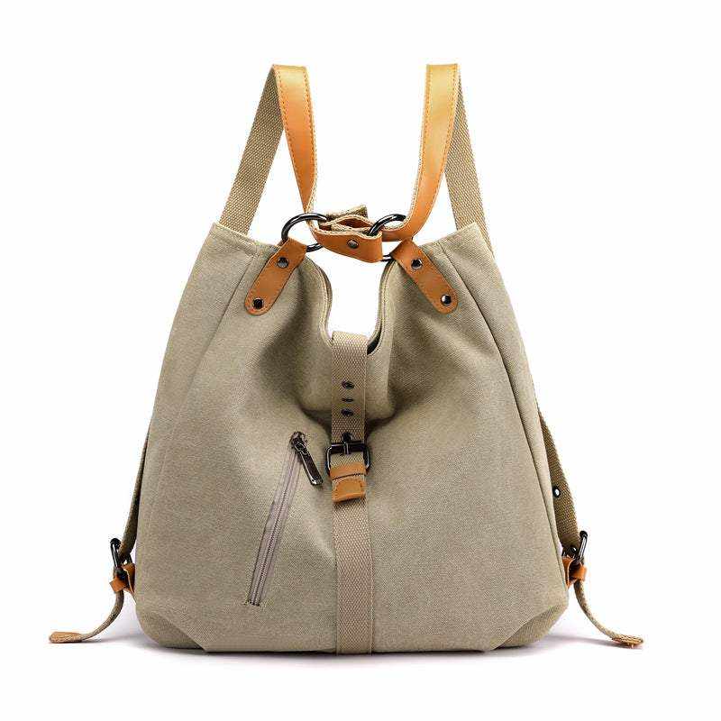 Convertible backpack purse handbag with canvas and vegan leather accents.