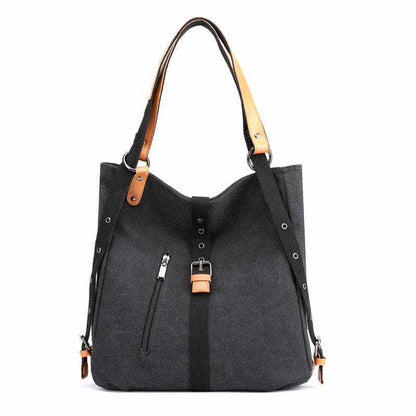 Convertible backpack purse handbag with vegan leather accents and adjustable straps.