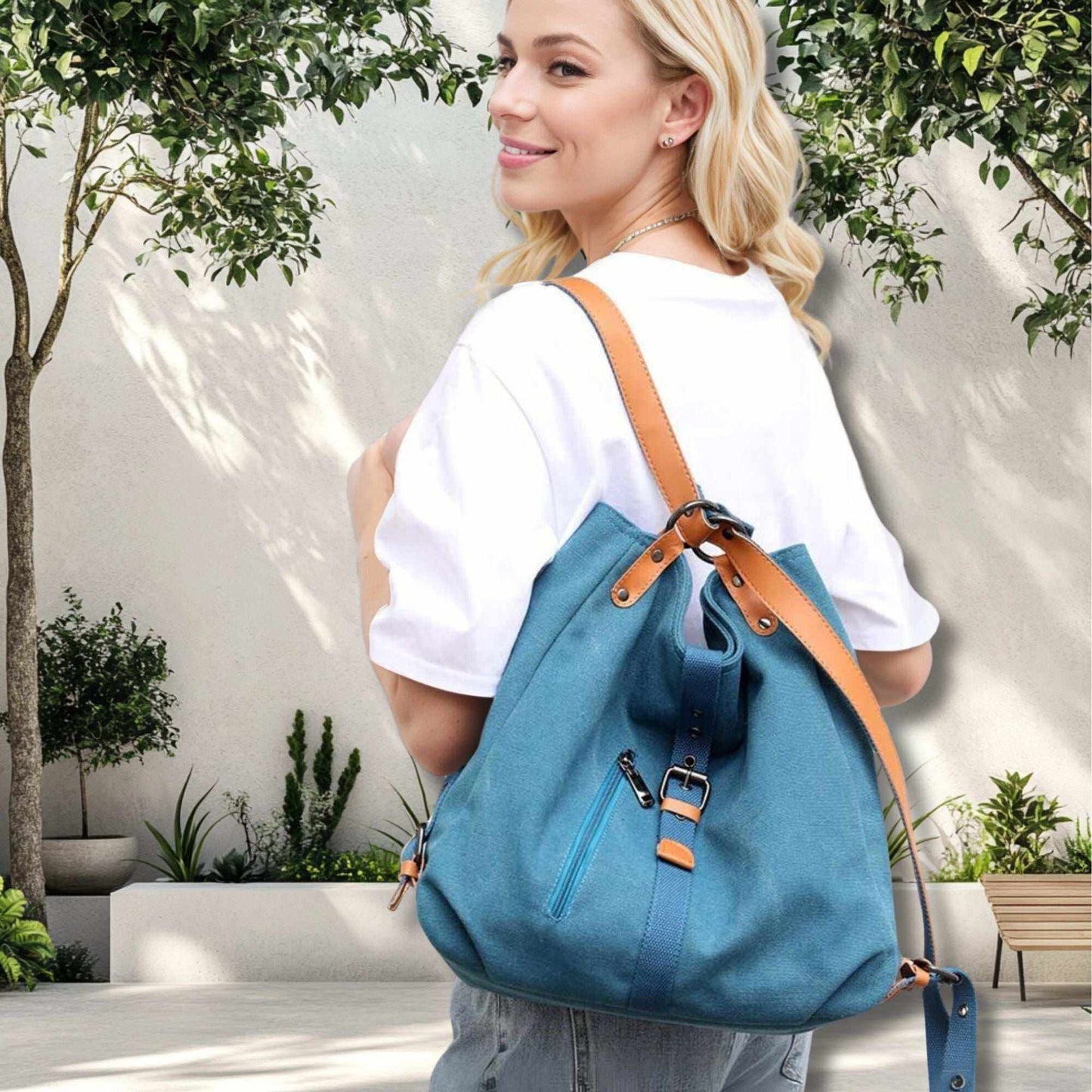 Woman wearing a blue convertible canvas backpack