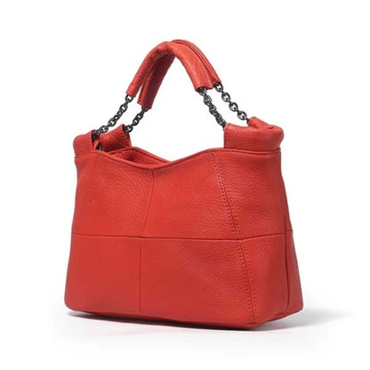 Red Cross Body Soft Leather Bag with chain-link handle, elegant design, and decorative stitching.