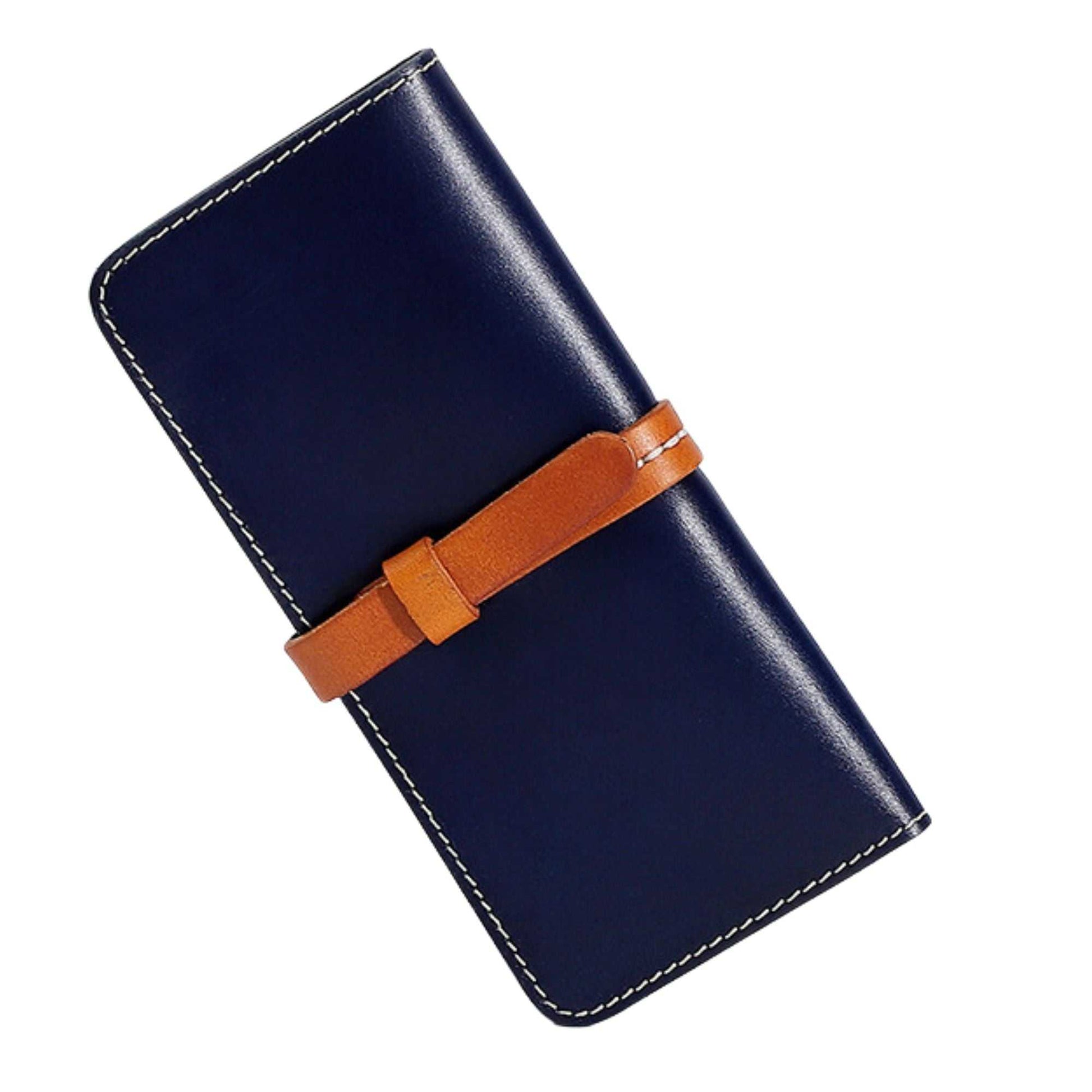 Deep blue female leather wallet with brown strap closure, featuring multiple compartments and premium stitching.