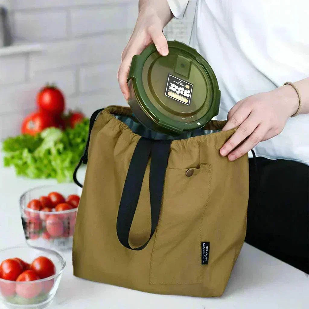 Insulated lunch pouch with drawstring closure, lightweight design, and large capacity, ideal for fresh food storage.