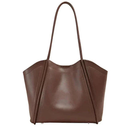 Ladies Leather Tote with spacious design and rolled leather straps in brown.