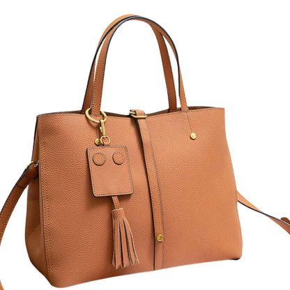 Ladies leather work bag with tassel, premium craftsmanship, versatile handbag, spacious interior, elegant design.