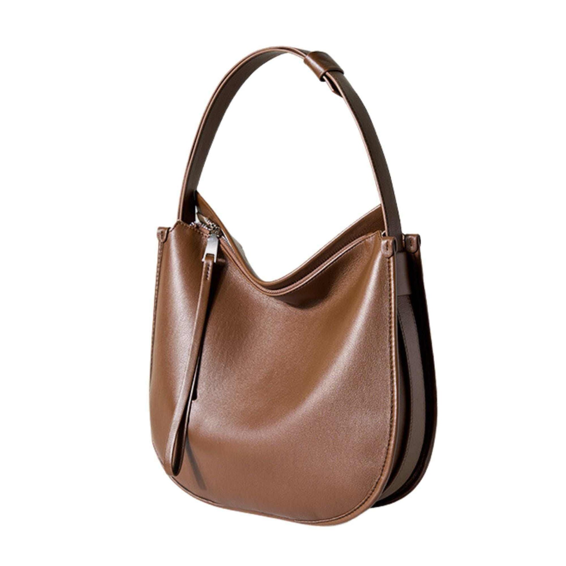 Large crossbody satchel in brown genuine leather with a sleek, structured design.