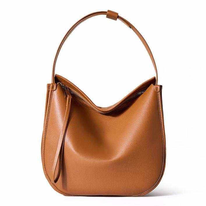 Large Crossbody Satchel in genuine leather with sleek design and structured style.