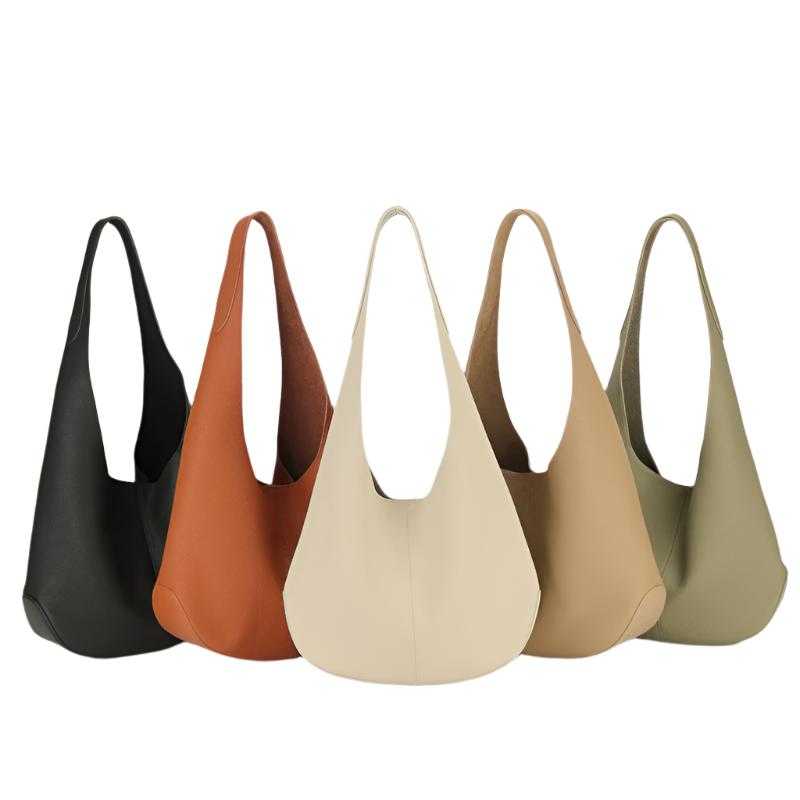 Large Leather Tote Bag in various colors, sleek and versatile design.