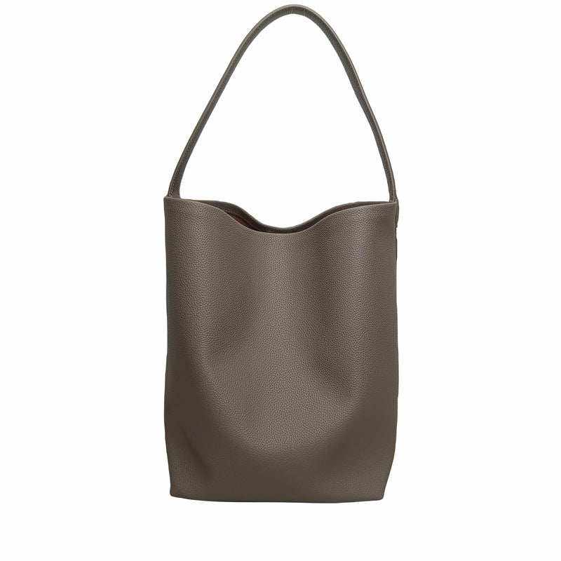 Iconic Leather Bucket Bag Lychee with chic design and spacious interior.