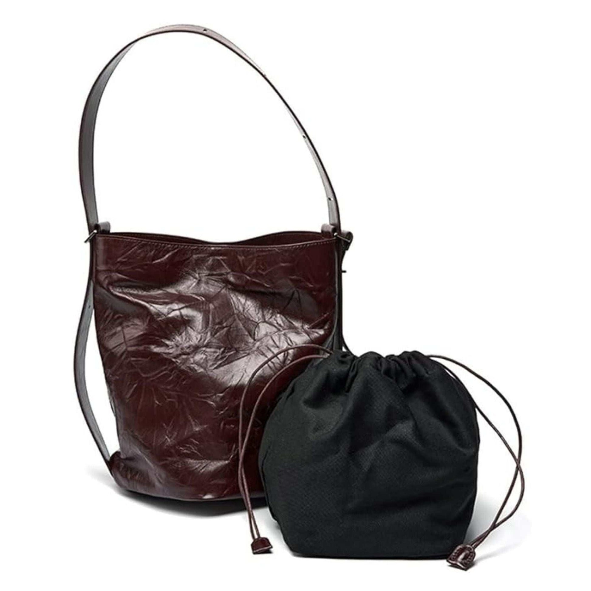 Leather convertible backpack with removable inner bag from Leather Bucket Handbags Collection.