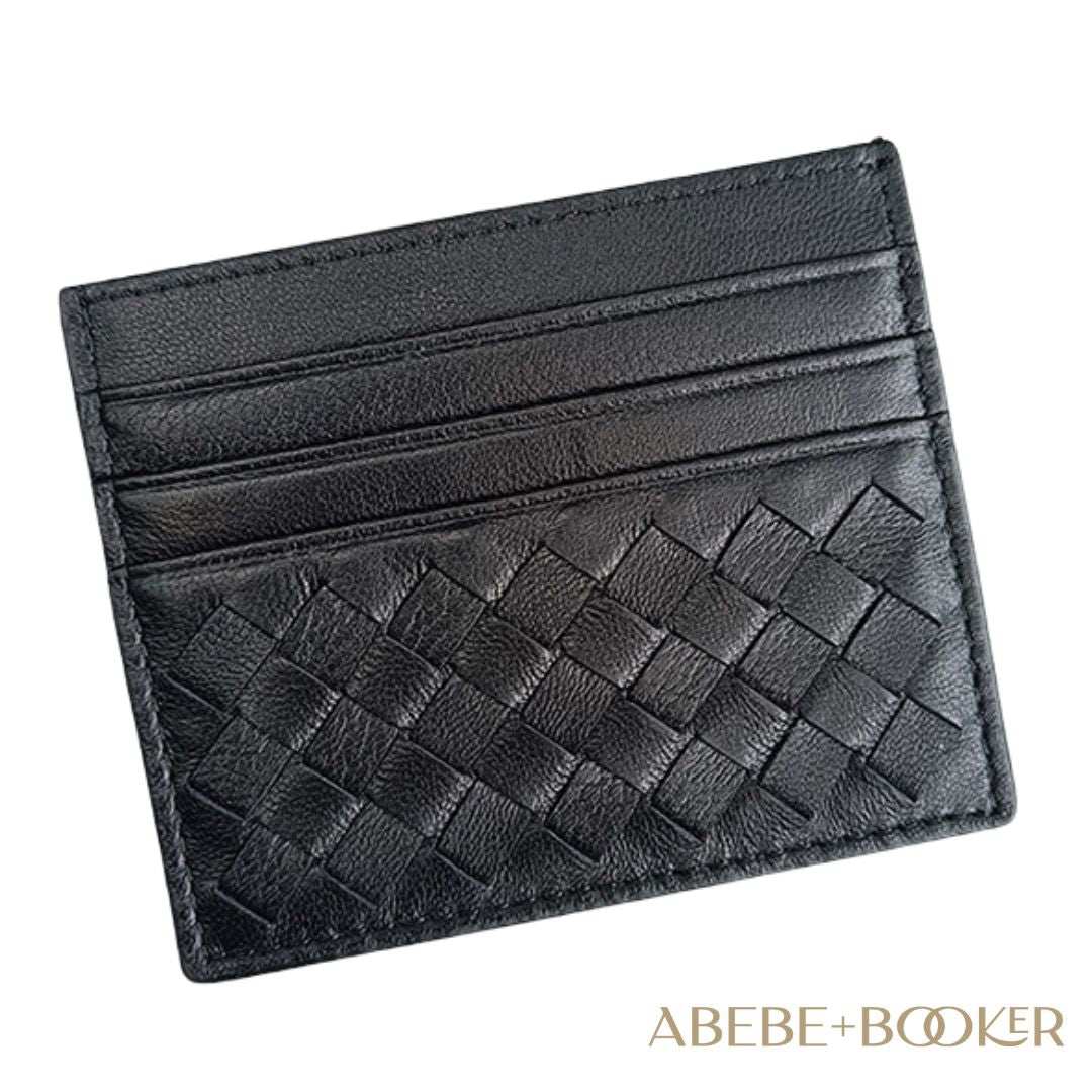 Leather credit card carrier with woven design, genuine leather, sleek and slim, black color.