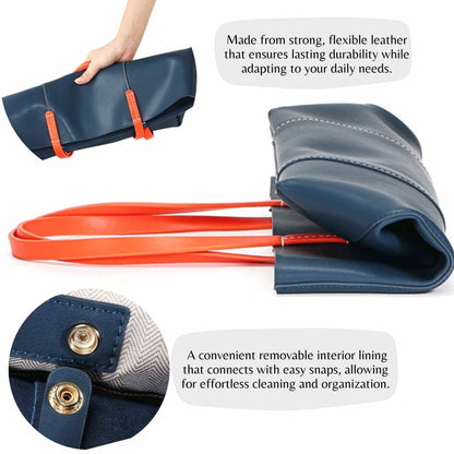 Leather handbag in navy blue with carrot-colored straps, made from strong, flexible leather and featuring a removable interior lining for easy cleaning and organization.