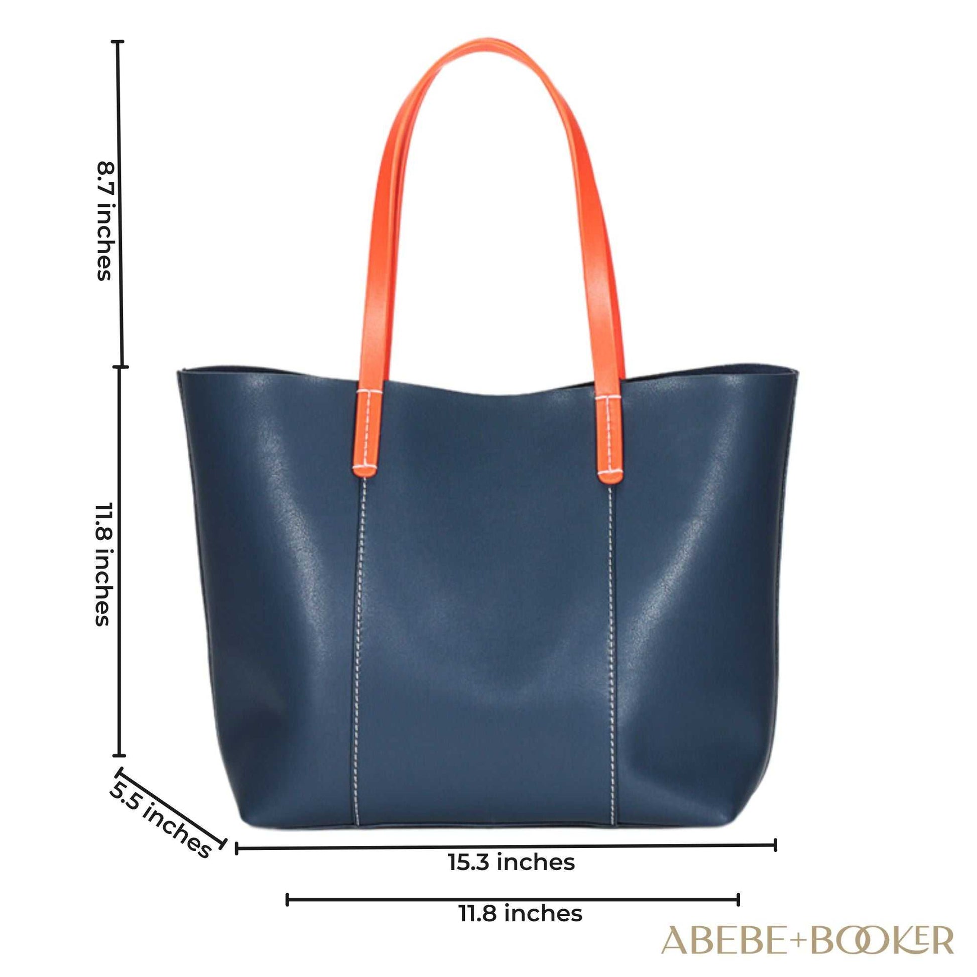 Blue leather handbag with orange straps, elegant design, part of Essence of Elegance Collection.