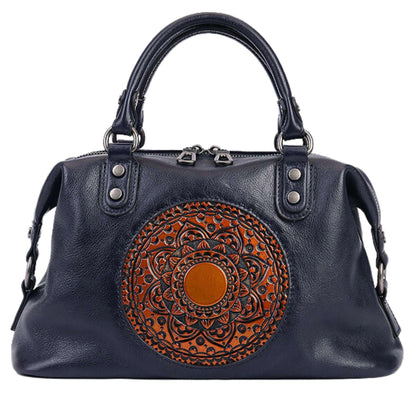 Genuine leather retro bag with embossed medallion design, elegant and functional handbag.