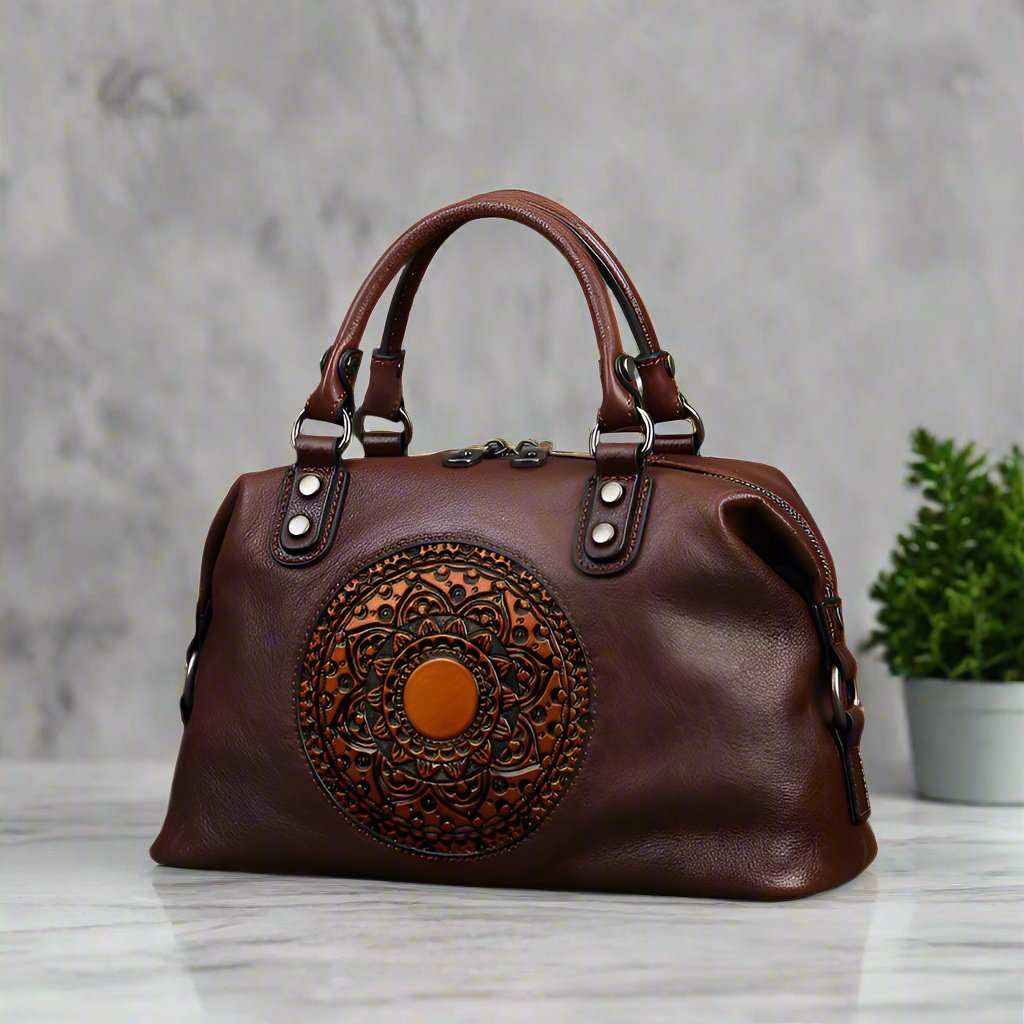 Genuine leather retro bag with embossed medallion design, elegant and vintage style.