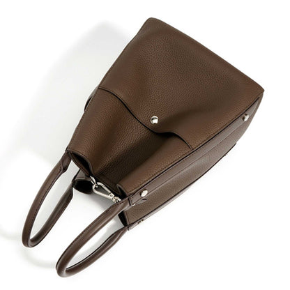 Luxurious brown leather tote bag crossbody with dual handles and stylish bucket design.