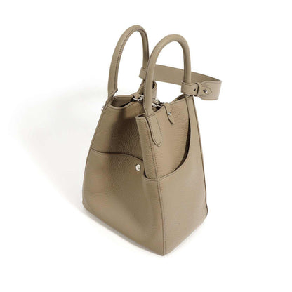 Leather Tote Bag Crossbody in high-quality genuine leather, versatile bucket design, in light brown.