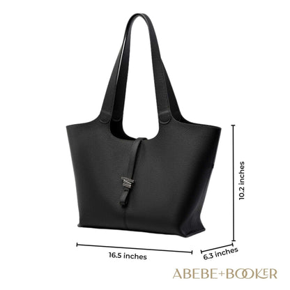 Black Leather Tote Purse with Zipper featuring a unique concave design.