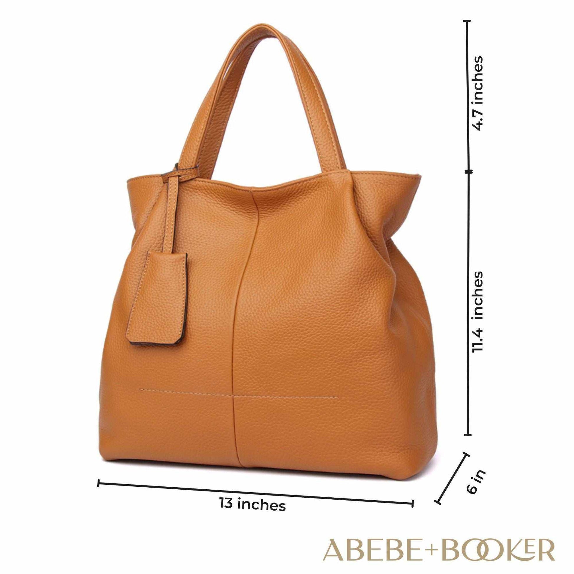 Leather tote zipper handbag, genuine leather, spacious, versatile, elegant design.