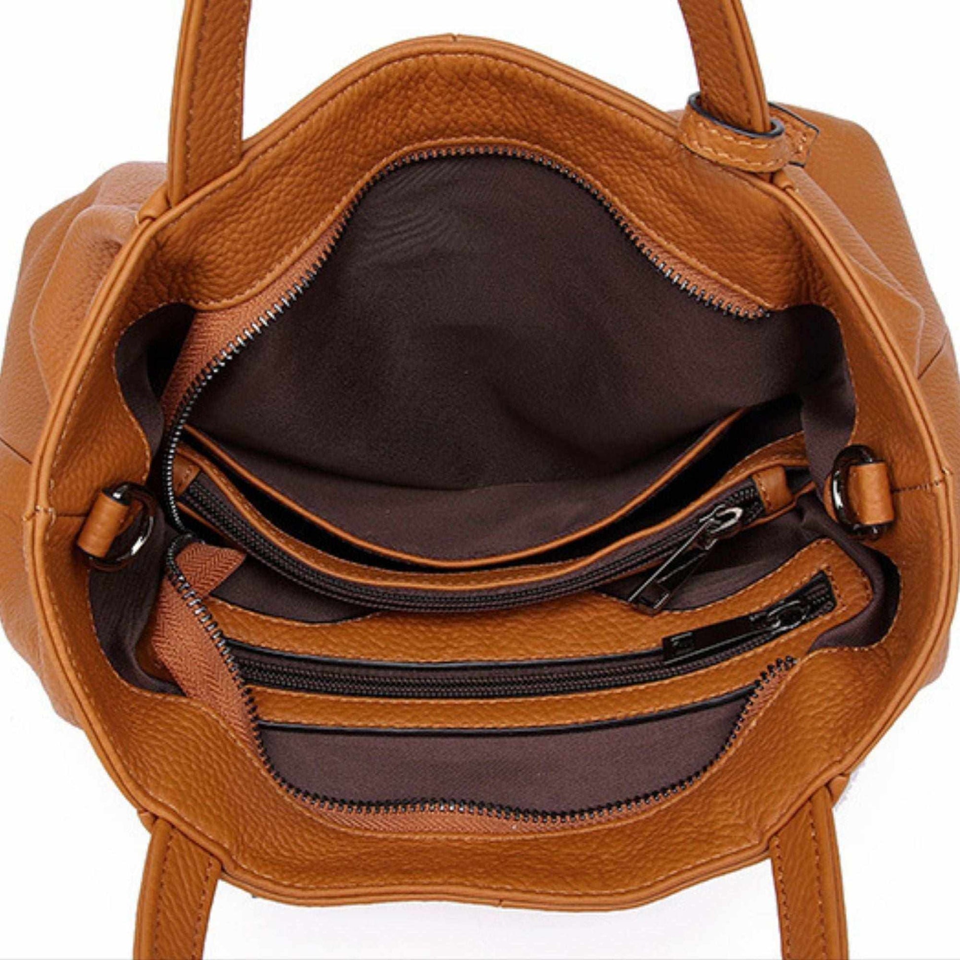 Genuine leather tote zipper handbag with spacious interior compartments and secure zipper closure.