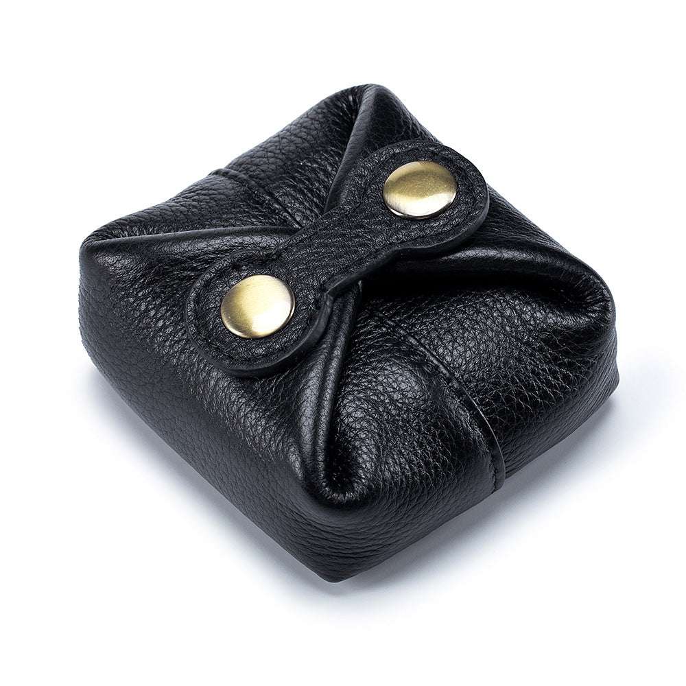 Soft leather lipstick case with bronze snap closure, stylish and versatile for everyday use.