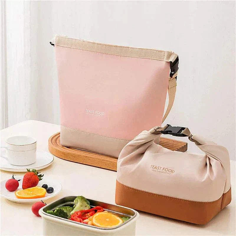 Lunch tote with shoulder strap in versatile designs, shown alongside fresh food.