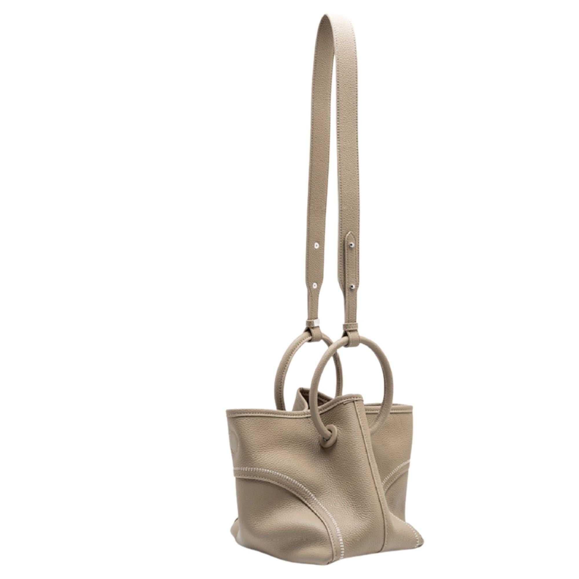 Leather crossbody bucket tote in full-grain lychee leather with removable pouch and chrome hardware