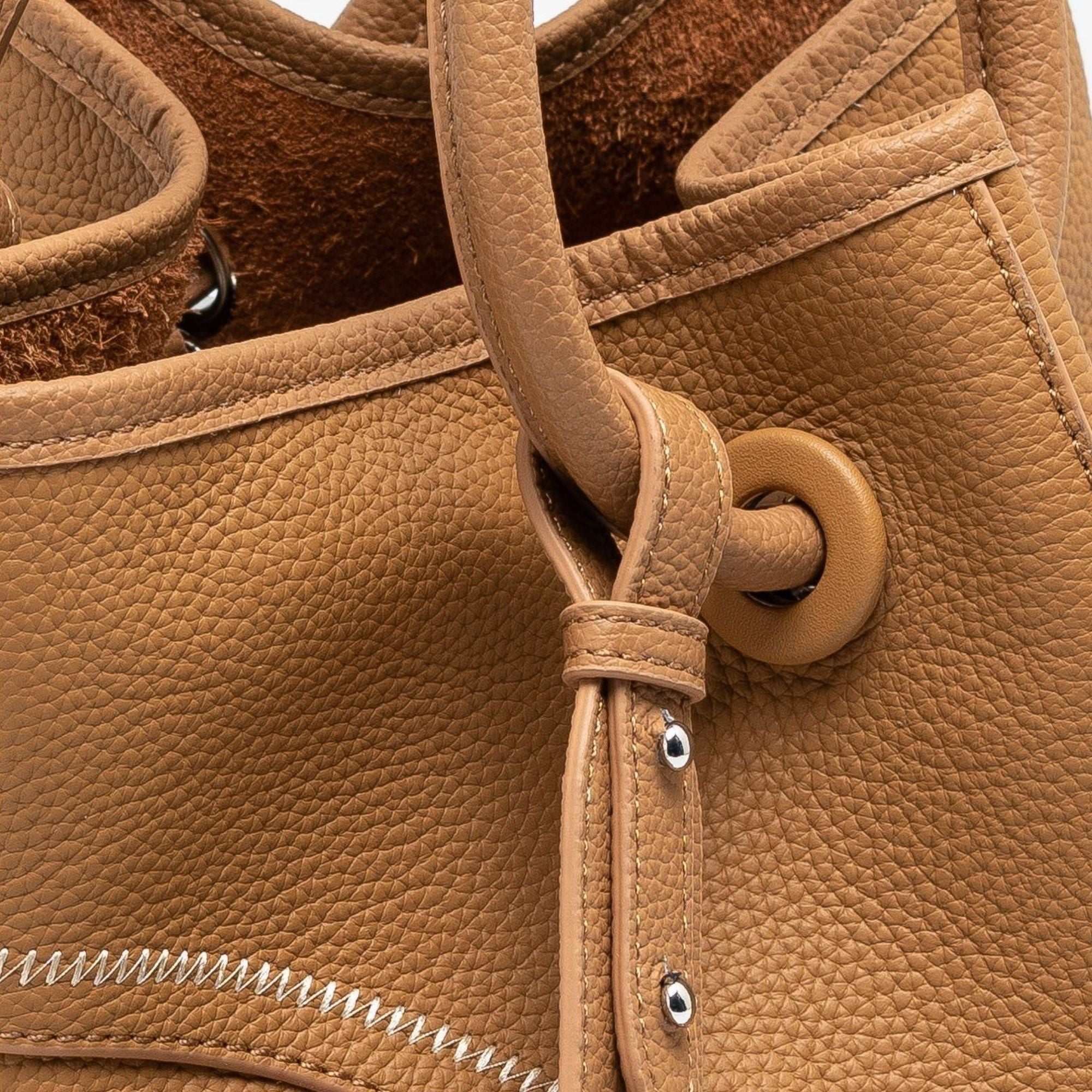 Mercer leather crossbody bucket tote with full-grain lychee leather and removable interior pouch