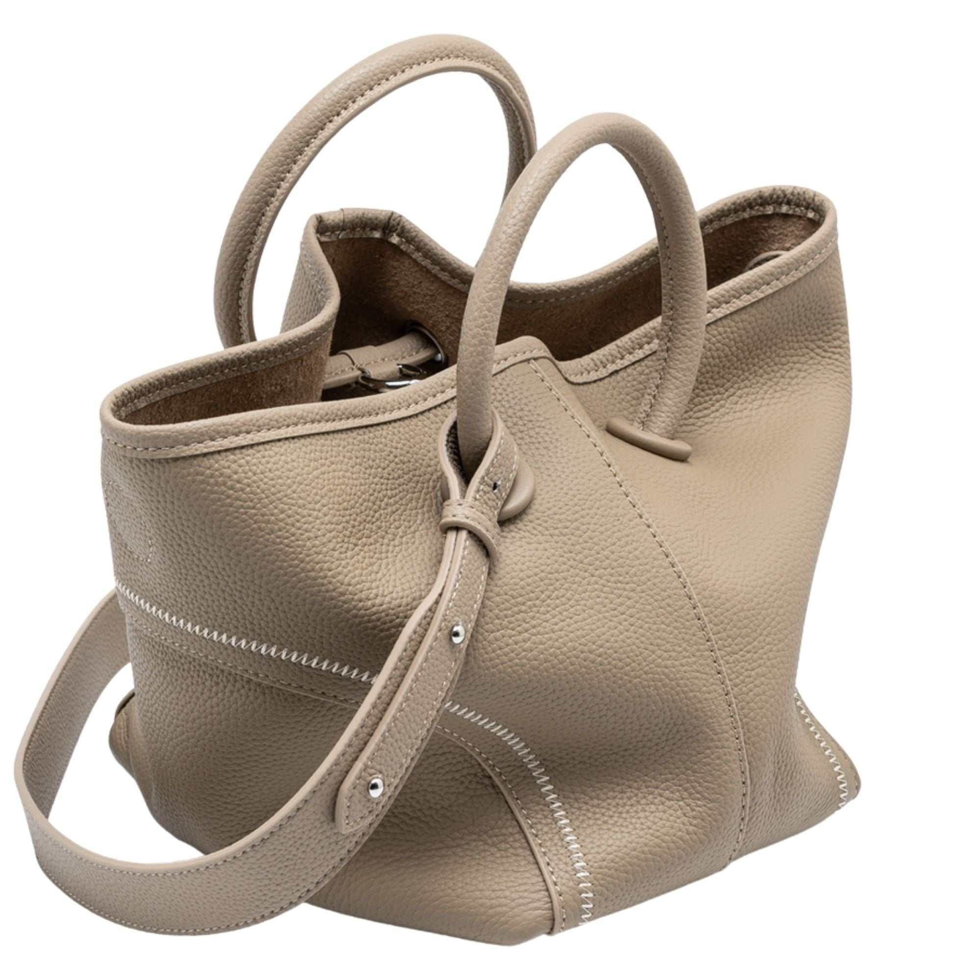 Leather crossbody bucket tote in full-grain lychee leather with circular handles and removable interior pouch