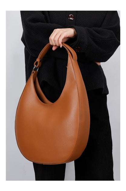 Genuine Leather Metro Crescent Handbag