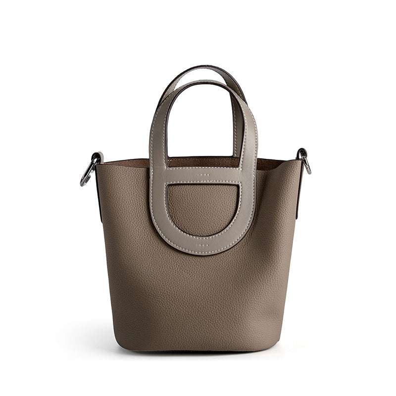 Sleek Leather Bucket Handbag in durable genuine leather with lychee-pattern design, removable interior bag,