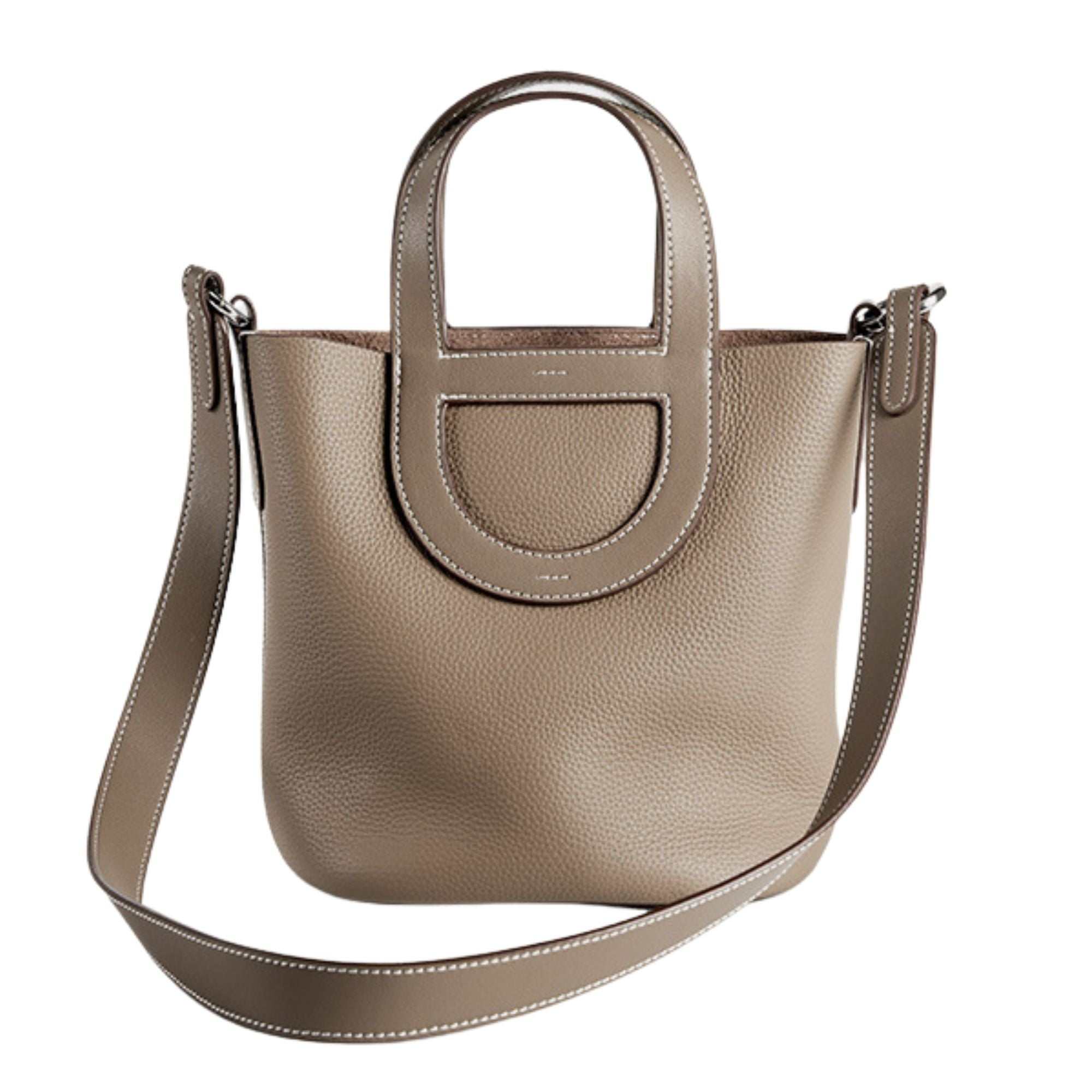 Sleek Leather Bucket Handbag with genuine leather and removable shoulder strap, featuring a lychee-pattern design.