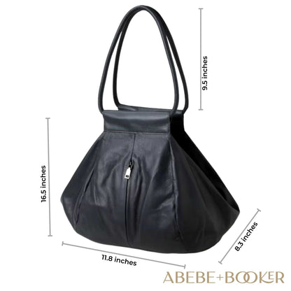 Slouchy leather bag in black with dimensions; features durable genuine leather, versatile design, and secure zipper closure.