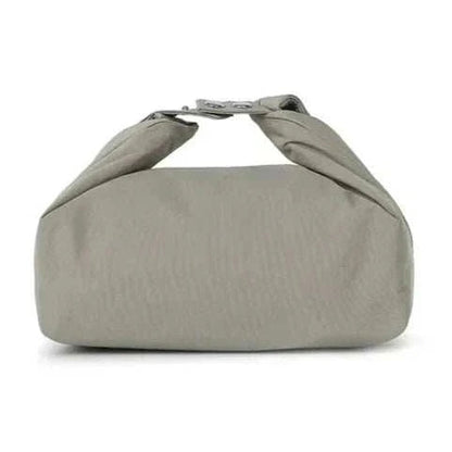 Small lunch bag in sleek gray design, made of durable nylon, with foldable top and thermal insulation.