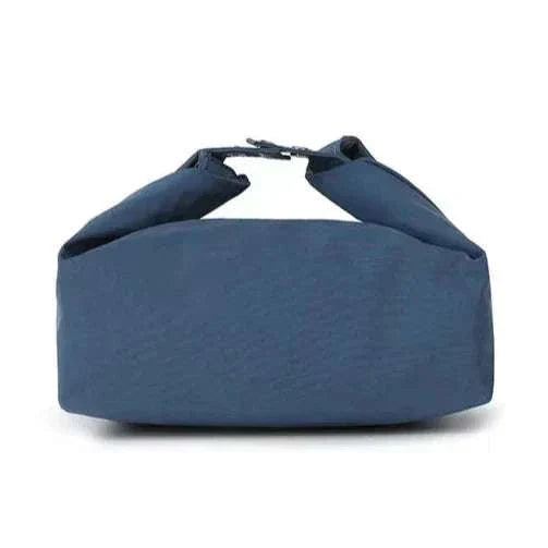 Small navy lunch bag with handles, designed for portability and thermal insulation.